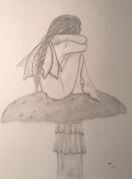 Desperate crying fairy on her mushroom